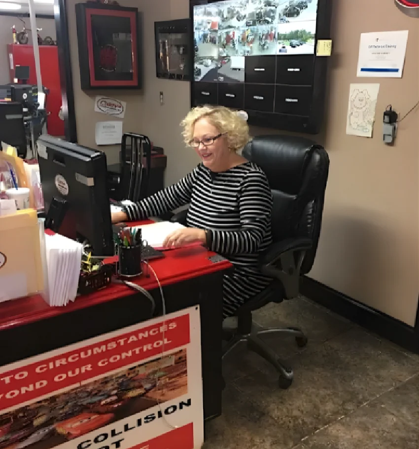 Receptionist working at desk